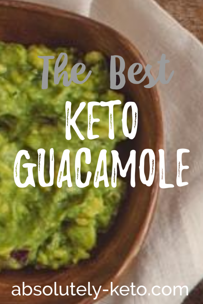 Brown bowl filled with green Keto Guacamole