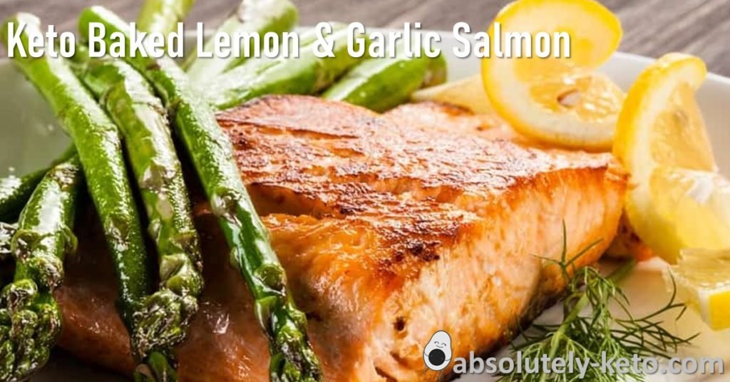 Perfect Baked Lemon & Garlic Salmon with Asparagus on a plate