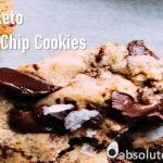 The best keto chocolate chip cookies on a plate broken up